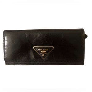 SOLD Prada large wallet in black crackled leather. Never used. Vintage.